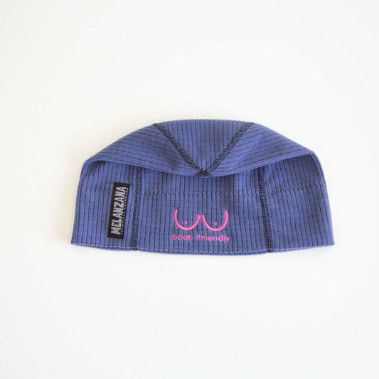 Blue ribbed beanie with a logo and text on a white background