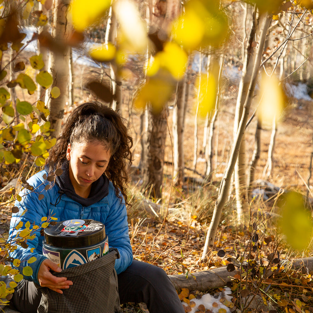 backpacking woman on trail