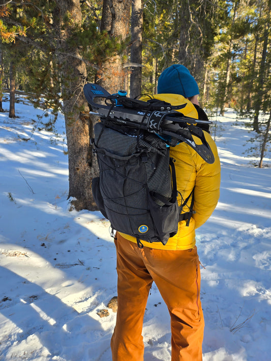 Snowshoes attached to Aspen backpack using Y strap