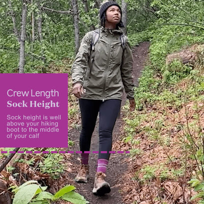 woman on trail wearing pink socks